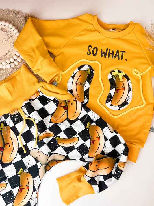 Sweater & Slim Harem Hose Kinder Set – schwarz-weiß kariert mit lustigen Bananen, „SO WHAT“ Bügelbild & Applikationen – Unikat Kinderbekleidung